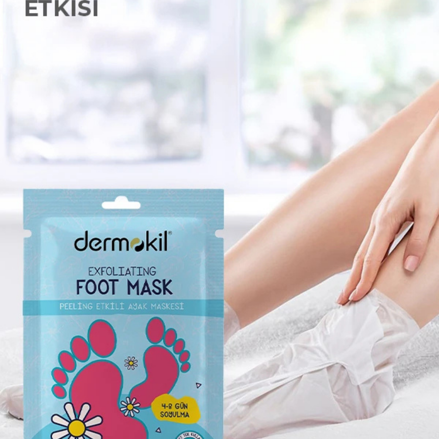 Dermokil exfoliating foot mask packaging with a blurred background of a person sitting.