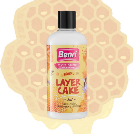 Benri Layer Cake body lotion bottle on a honeycomb background